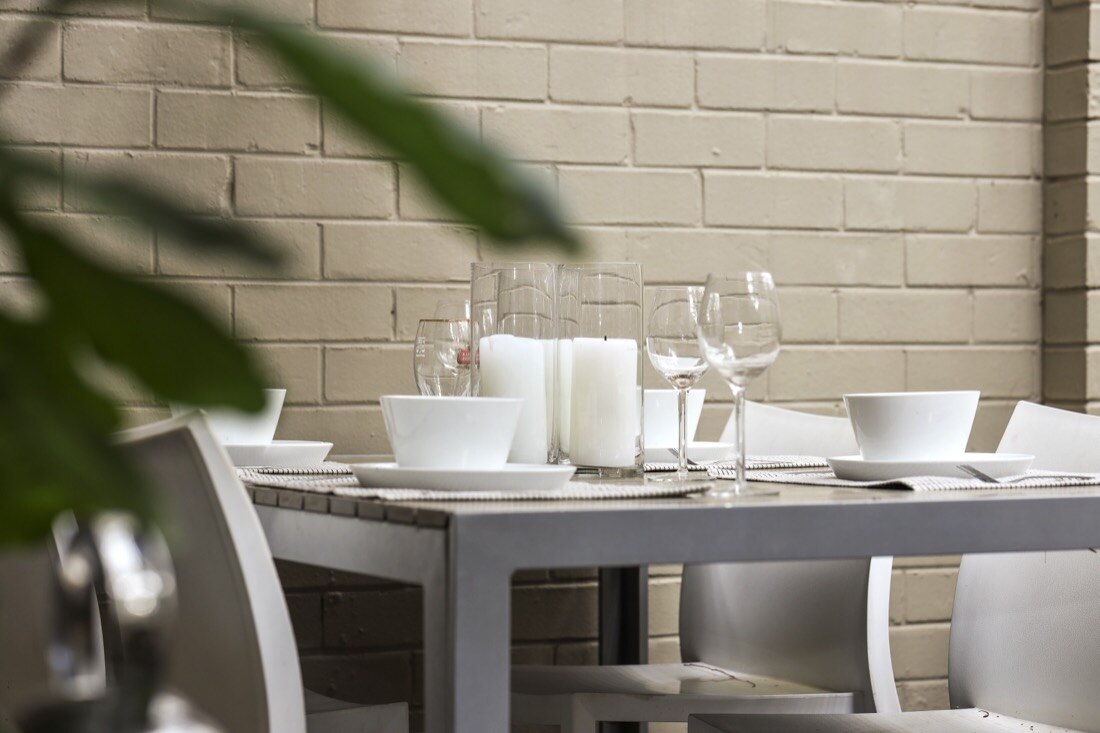 Styled dining area presented for sale